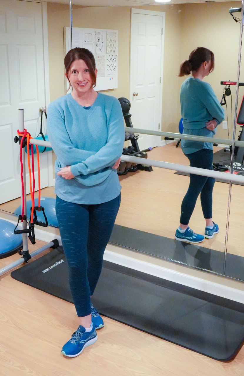 My typical daily uniform, workout gear layered with a sweater - Oliver Charles