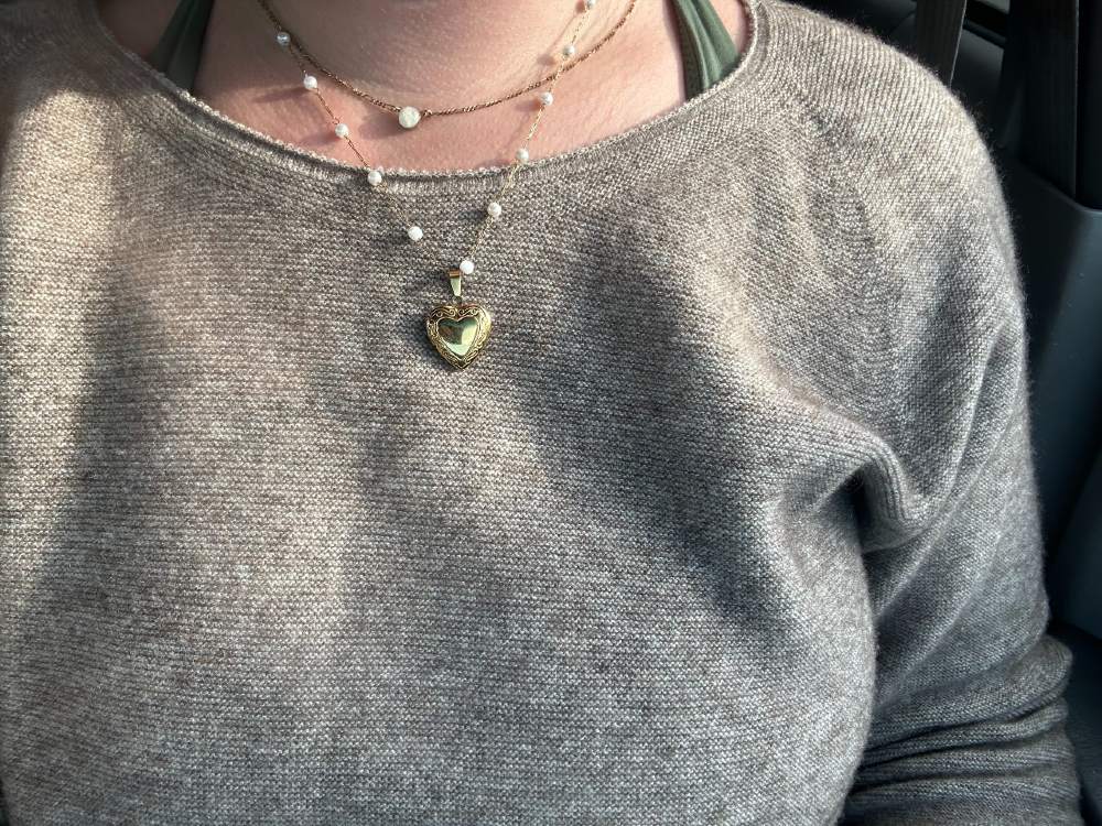 A Simple, Polished Outfit Pairing the Seamless Yak Wool Sweater With Jeans and a Necklace - Oliver Charles